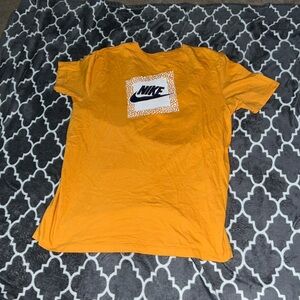 yellowish orange nike shirt M (men’s)